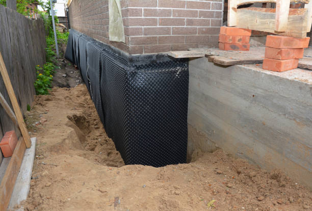 Happy homeowners after waterproofing job in Darlington